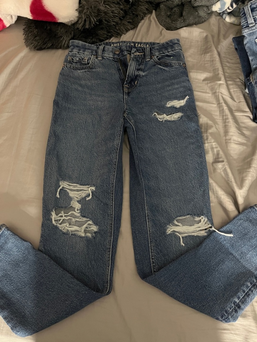 American Eagle Outfitters Distressed Dark Blue 
Size 000
Never worn